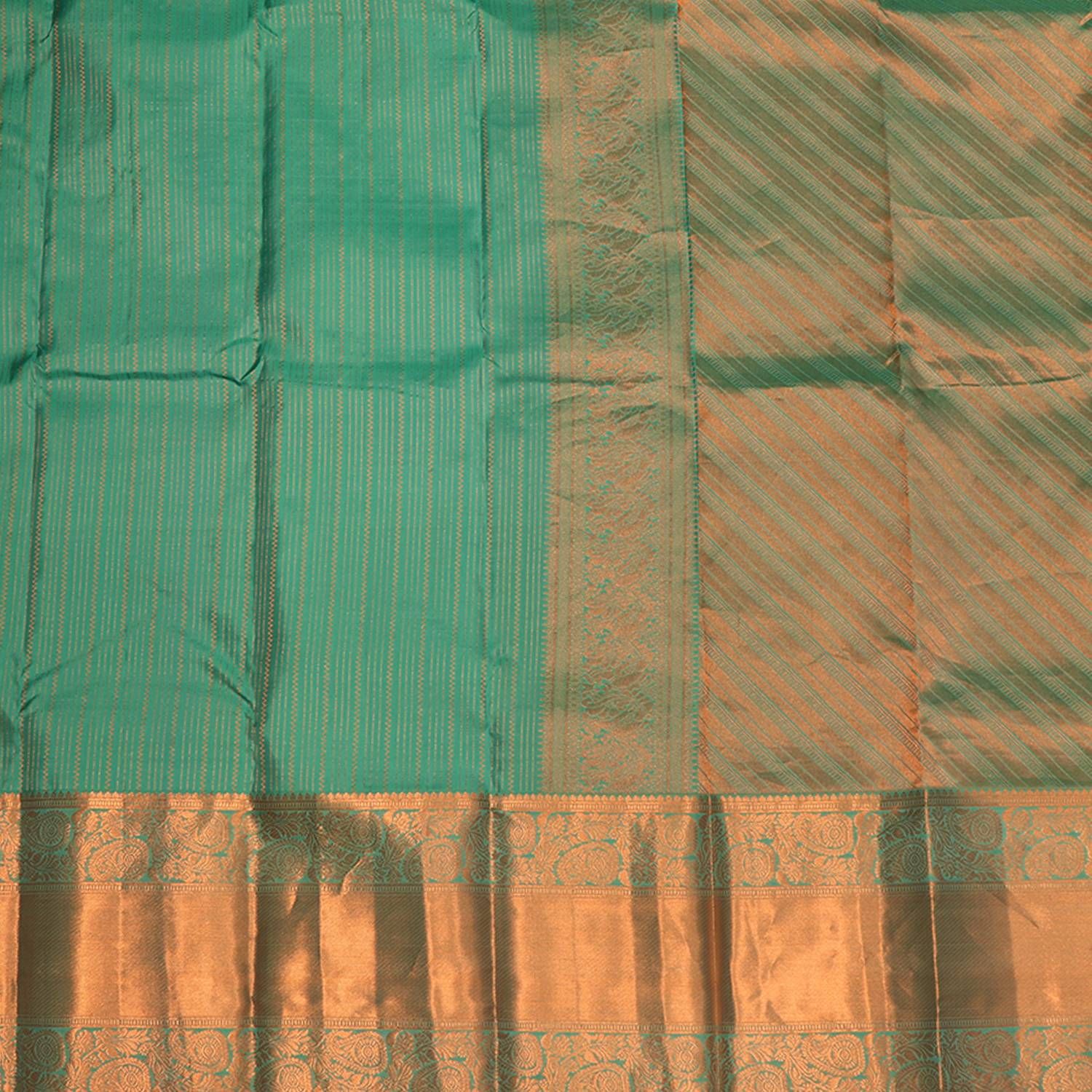 Deep green plain kanchi cotton saree, contrast traditional design