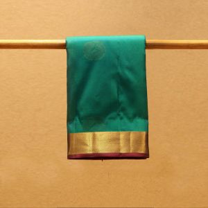 Safer Green Coloured Kanchipuram Silk Saree with Contrast Red Colour Pallu.