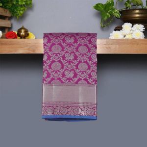 Violet Coloured Kanchipuram Silk Saree with Silver zari Pallu.