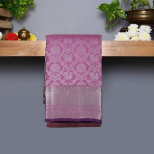 Lilac Coloured Kanchipuram Silk Saree with Silver Zari Pallu.