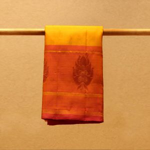 Mustard Coloured Kanchipuram Silk Saree with Contrast Mejanta Pink Pallu.